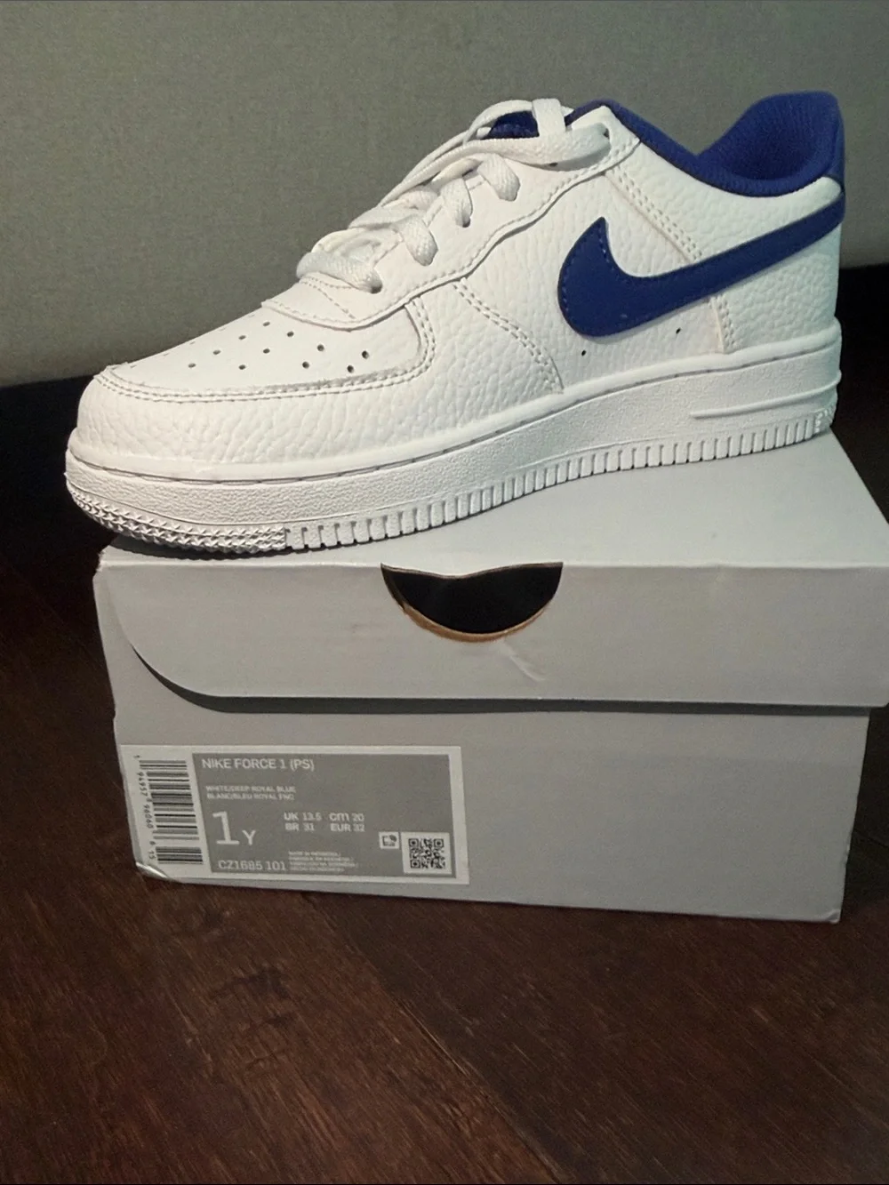 Nike Kids White Sneakers with Blue Swoosh